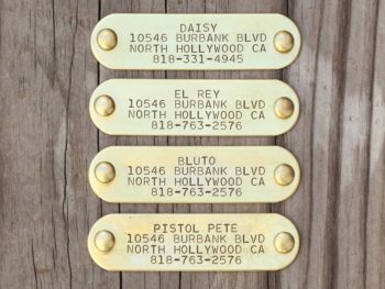 Solid brass, stamped nameplate with rivets
